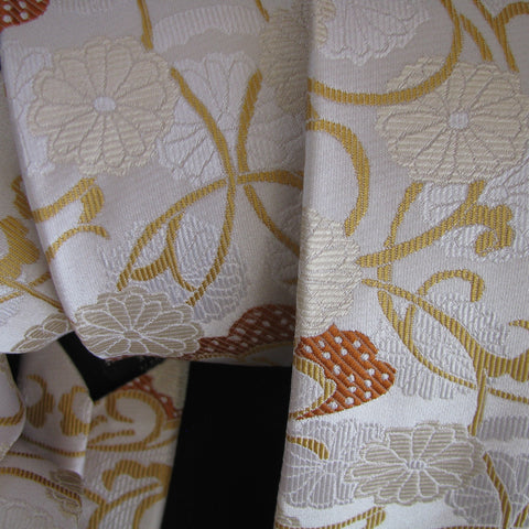 Gold & orange on cream Vase Design silk tie