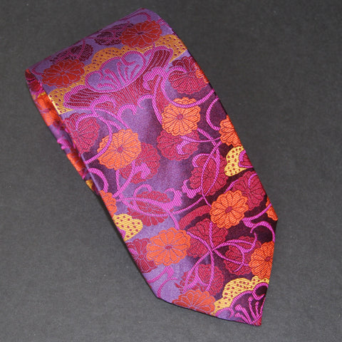 VASE - gold, orange, red on purple