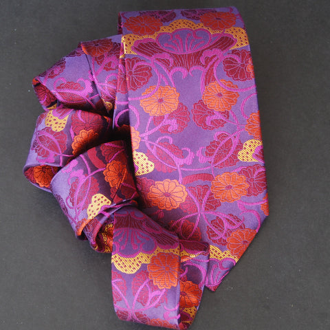 VASE - gold, orange, red on purple